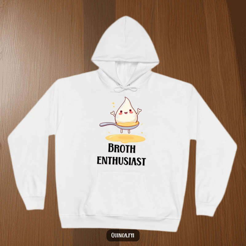 Funny hoodie featuring a joyful anthropomorphic broth droplet happily riding a miniature spoon, offering cozy and humorous style.