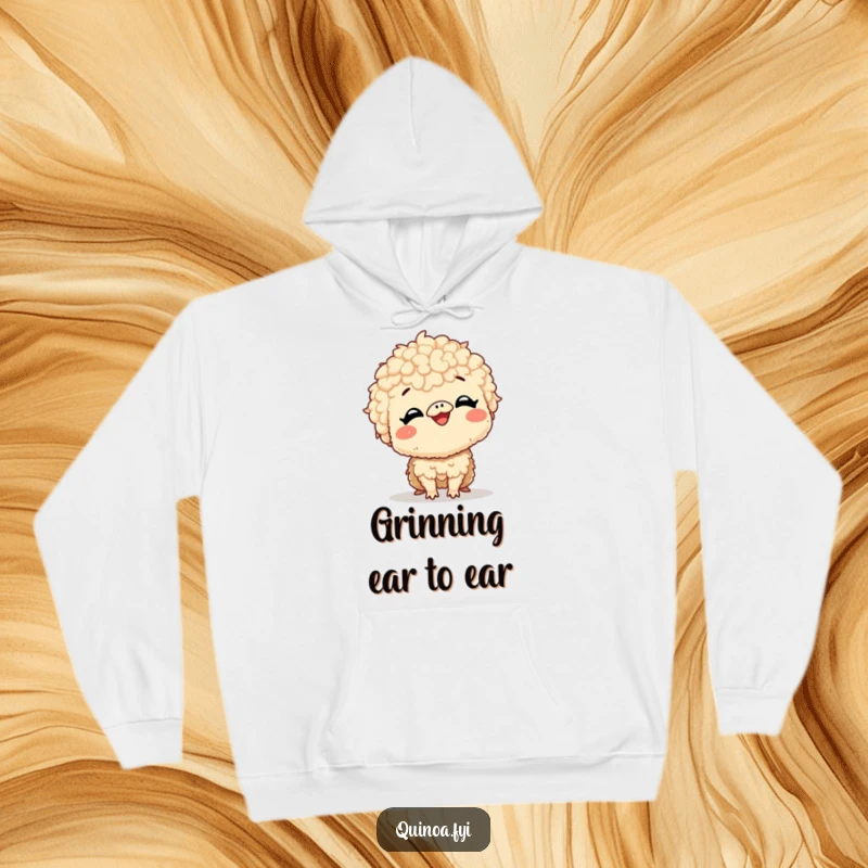 Funny hoodie featuring a giggling quinoa creature with a very large, excited smile, offering warmth and a dose of infectious laughter.