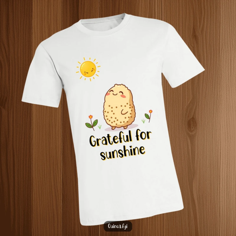 Funny t-shirt featuring a contented quinoa character gazing at a smiling sun graphic, perfect for spreading positivity and warmth.